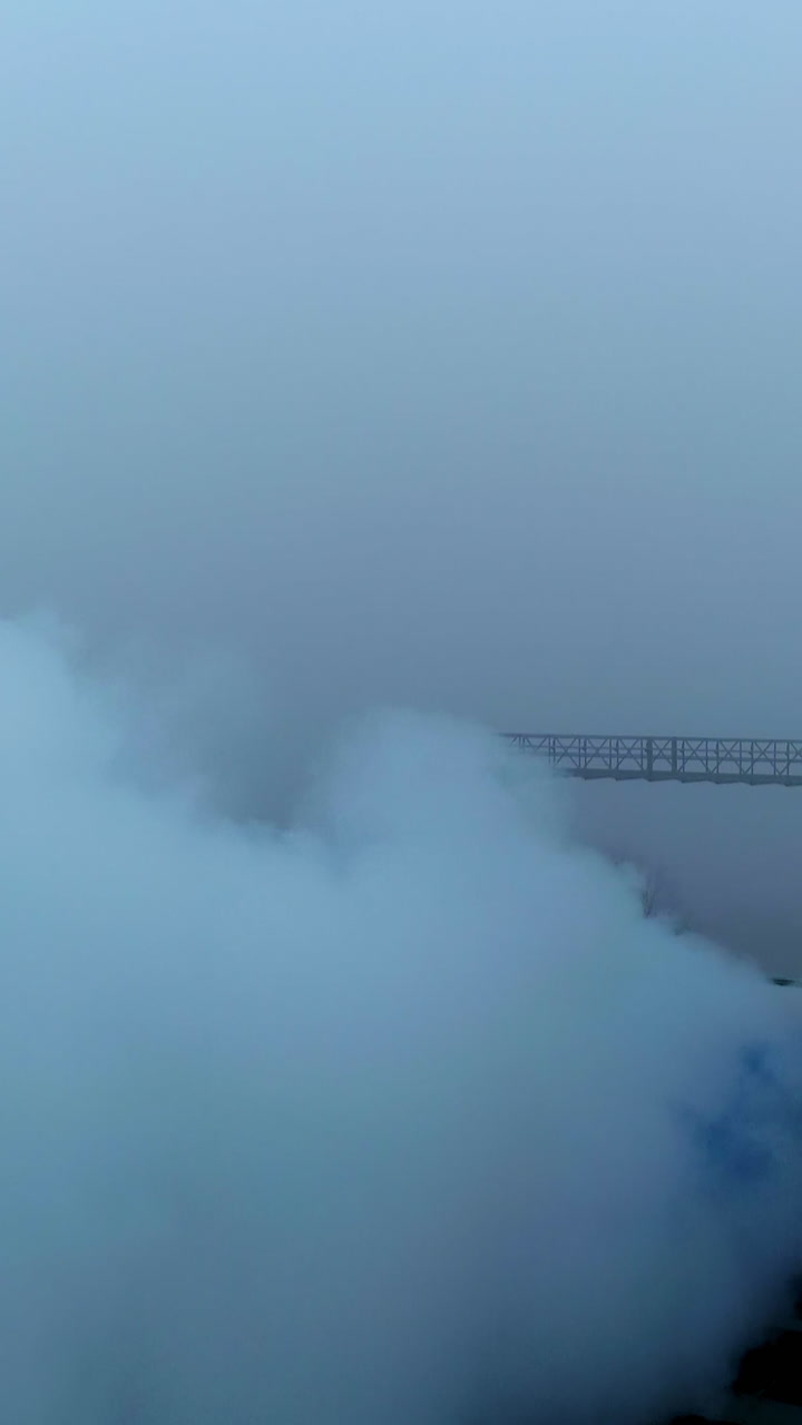 Big agricultural grain elevator. Aerial view of industrial elevator construction. Vertical video