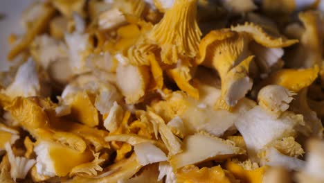 yellow mushrooms. stack of chanterelles read