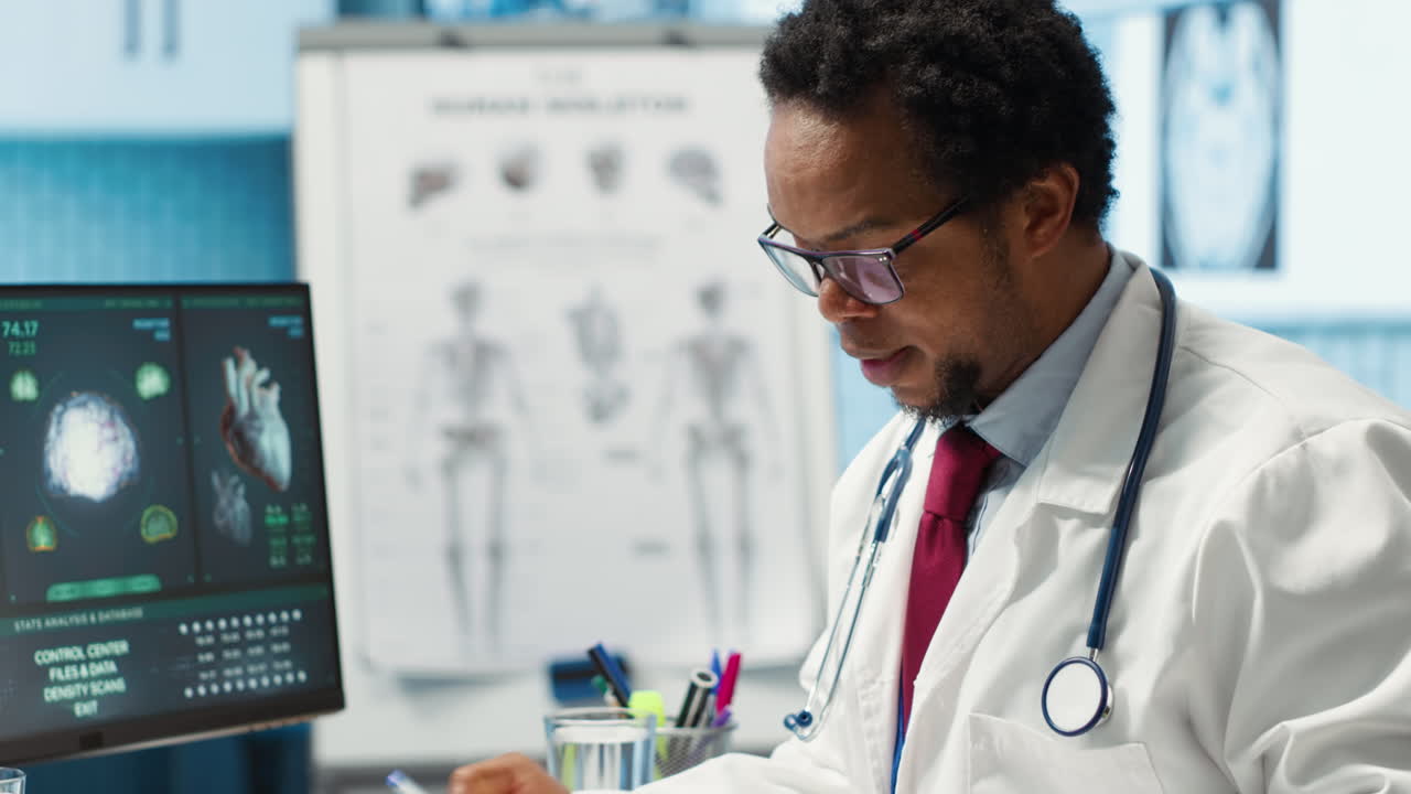 Professional medic analyzing x ray imaging and test findings in office