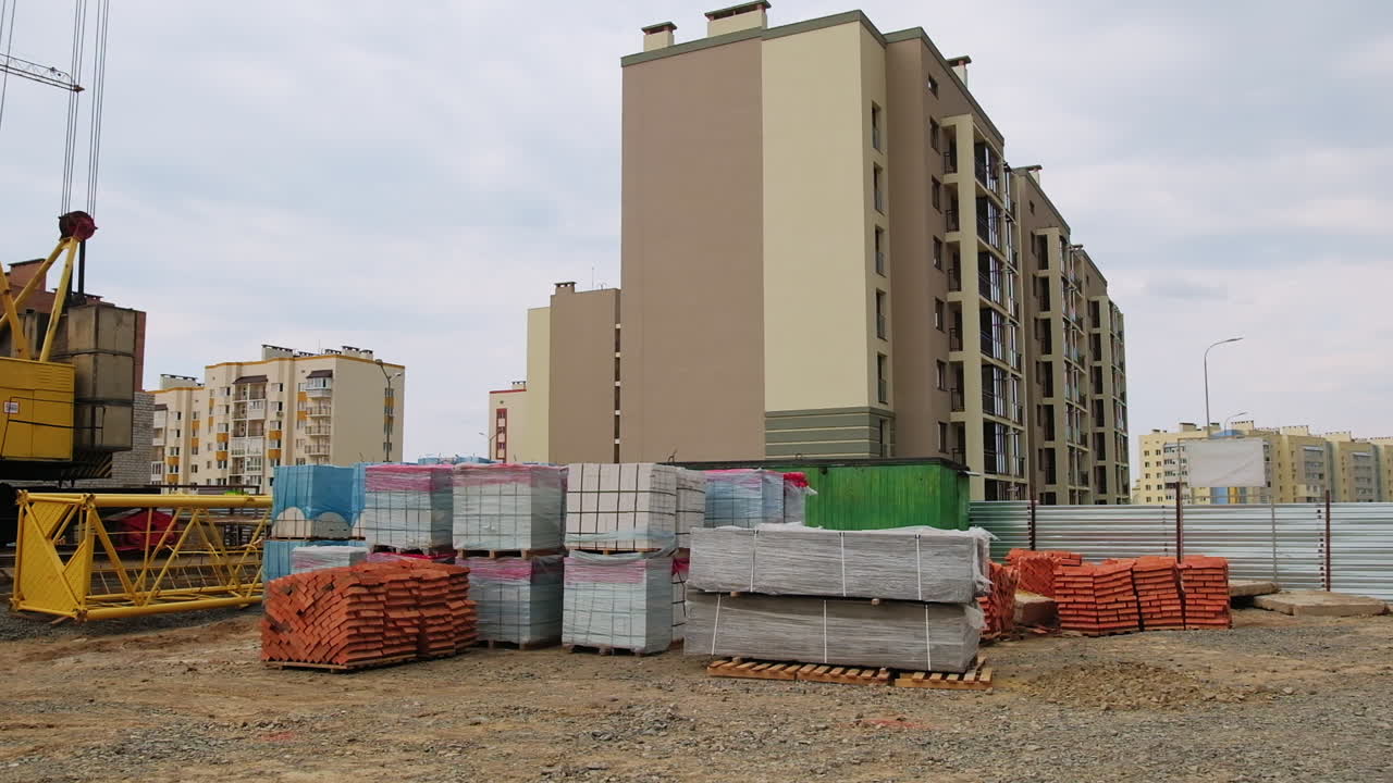 Construction Site with Apartment Building Under Construction