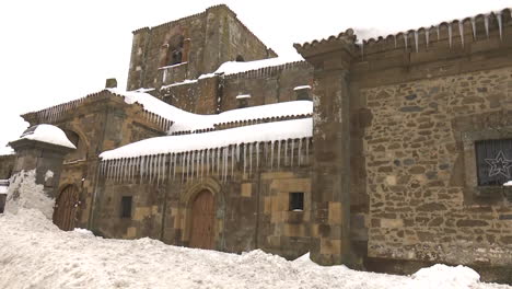 snowy church with icicles