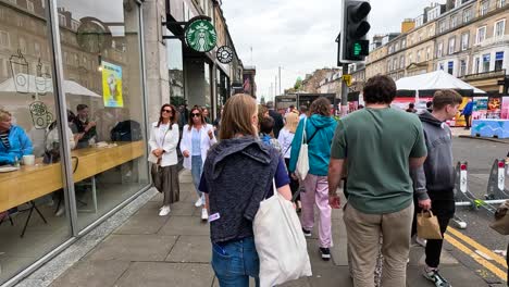 people walking on a busy street