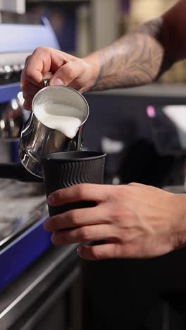 barista preparing coffee drinks