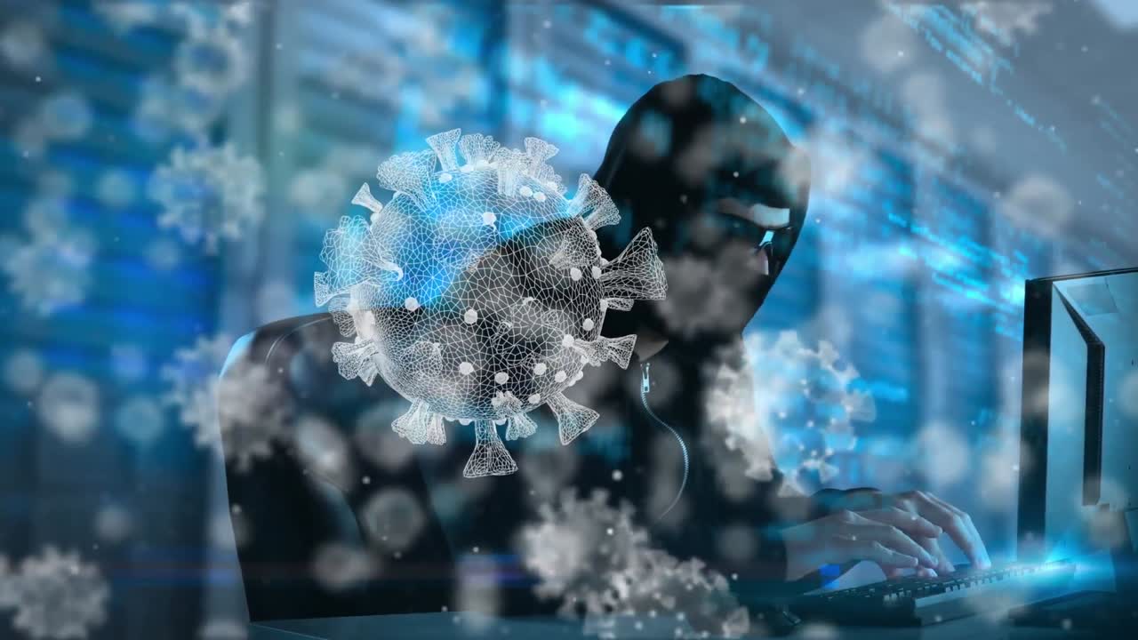 animación de las células macro covid19 sobre un hombre que lleva una balaclava, usando una computadora portátil