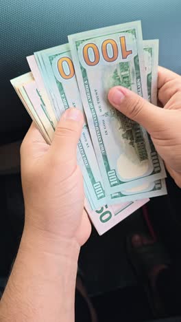 Hands Counting American Dollar Bills