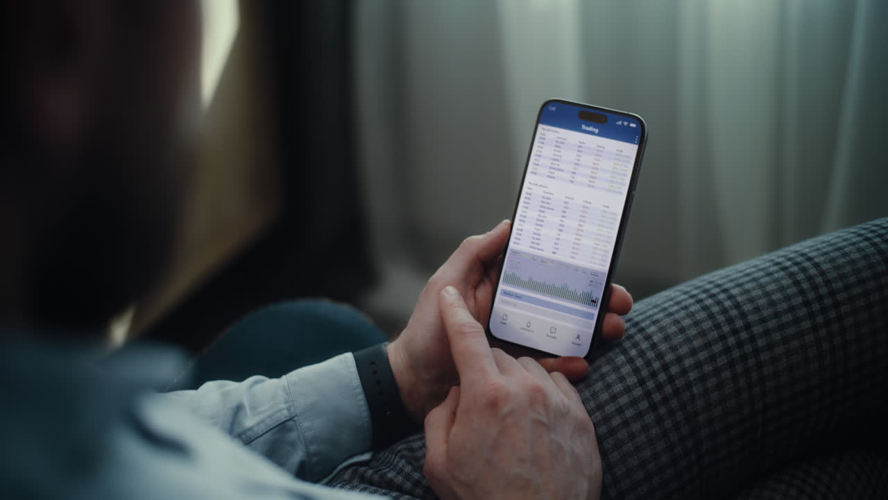 Close Up of Serious Female Stock Exchange Broker Monitoring Real-Time Stocks, Exchange Market Charts. Unfocused Computer with Multi-Monitor Desktop. Professional Investment Agent Working in Office.