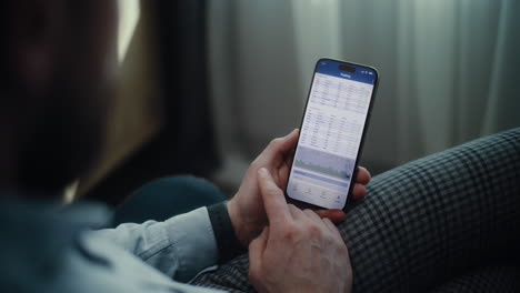 close up of serious female stock exchange broker monitoring real-time stocks, exchange market charts. unfocused computer with multi-monitor desktop. professional investment agent working in office.