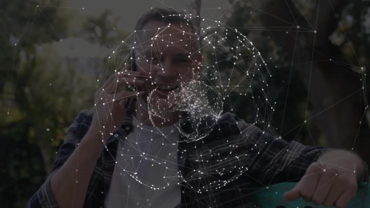 Man holding smartphone to ear using tech wireframe globe appearing lowering phone growing pensive
