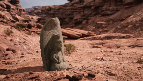 ancient statue on the rocks desert