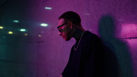 stylish man in neon city