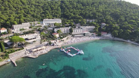 Dubrovnik's-Uvala-Lapad-Beach,-Croatia:-Aerial-of-coastline-and-resorts