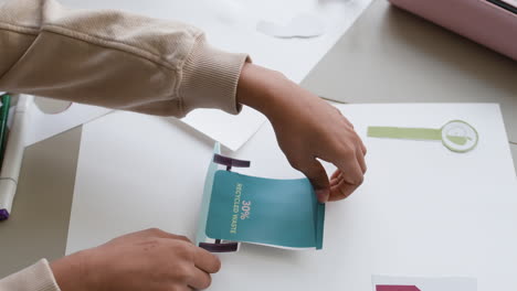 Child creating a recycling presentation