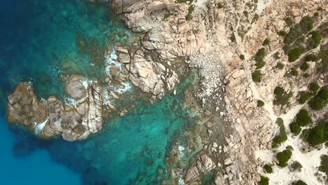 aerial view of malfatano cape in sardinia, italy.