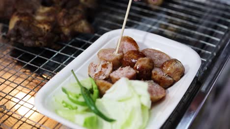 sausages and vegetables served at a street food stall