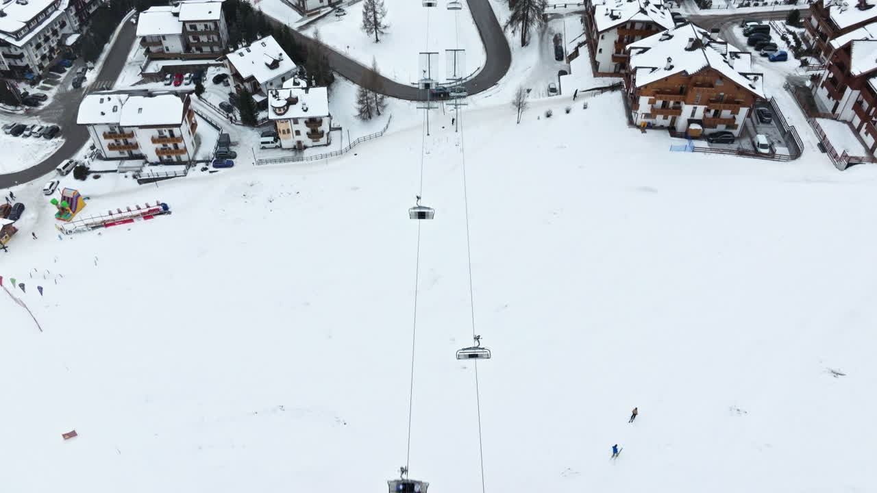 Aerial drone view of the Arabba ski resort in the Dolomites, Italy