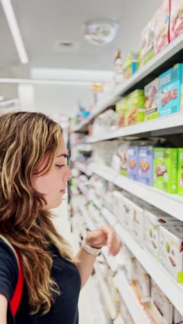 woman pondering a food purchase decision