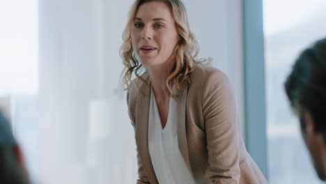 beautiful business woman team leader discussing creative ideas with shareholders briefing colleagues sharing company development strategy in office boardroom meeting 4k