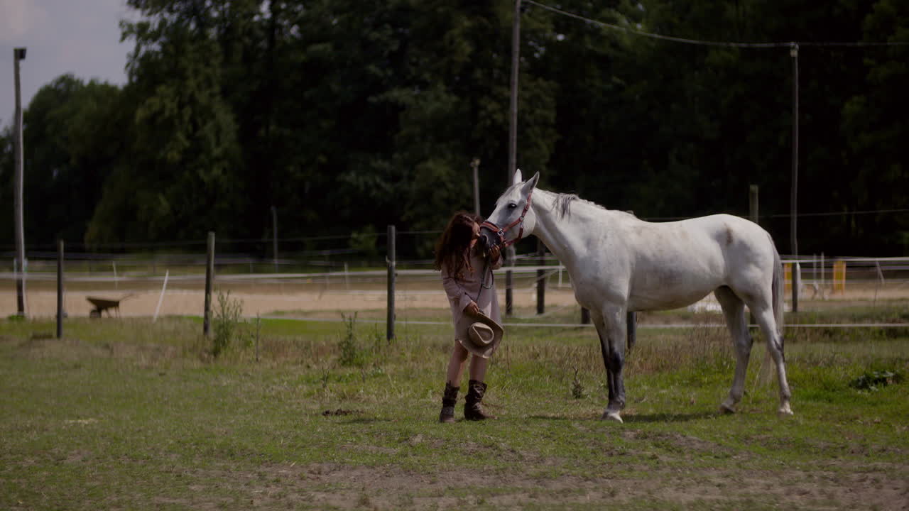 Woman with a White Horse in a Field
