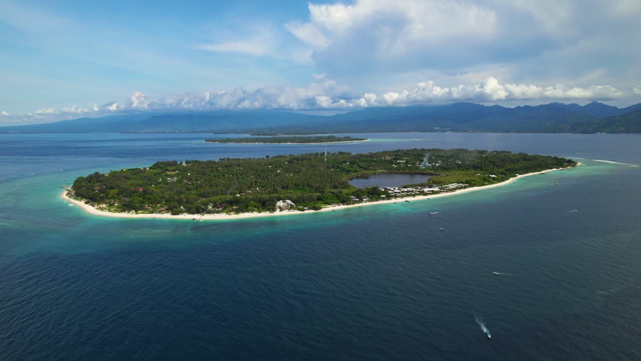 Tropical Gili Meno Island sunny day high aerial orbit, Indonesia