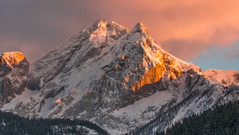 timelapse of a mountain peak at sunset in italy