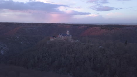 4k sunset at castle falkenstein during winter, meisdrof, harz, germany