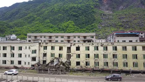 broken homes and evacuating cars, the earthquake aftermath in sichuan province of lidung county, china