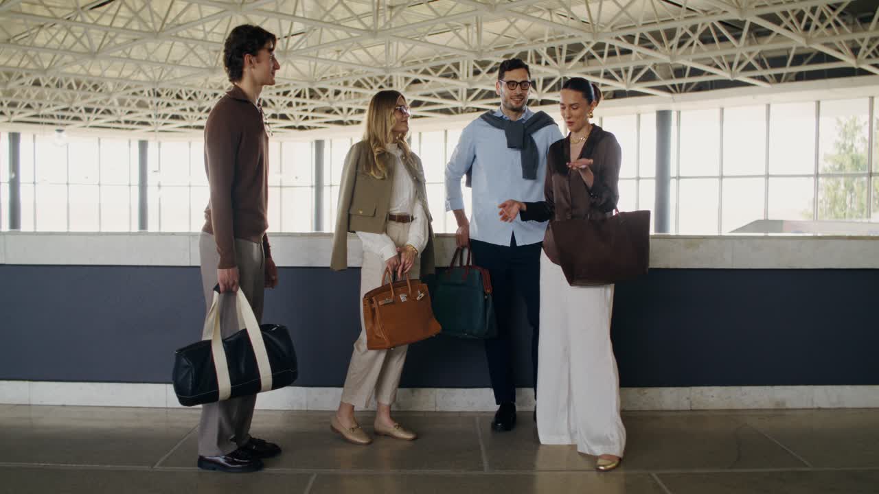 Group of friends having a conversation in a modern building