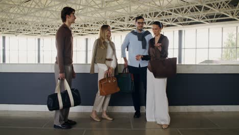 group of friends having a conversation in a modern building