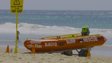 rescue boat stationed on sandy beach