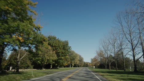 a trip by car on a clear autumn day, a view from the car window. drive on a typical american road