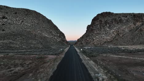 desolate road towards the parowan gap petroglyphs near cedar city in utah, usa