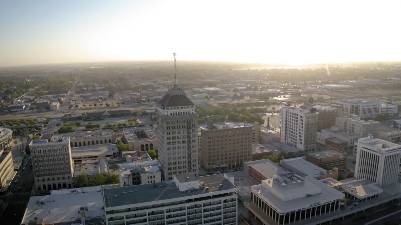 Aerial View of a City Skyline at Sunrise or Sunset