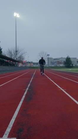 man running on a track