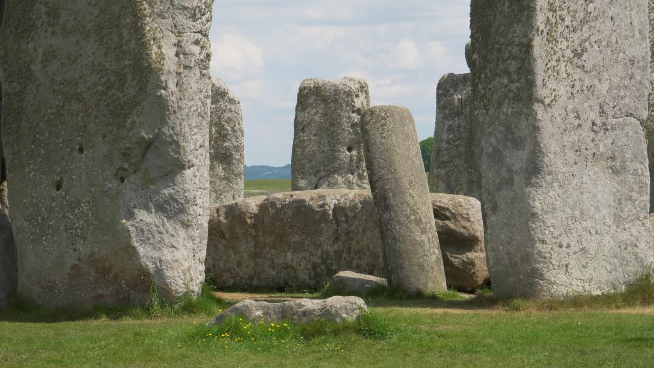 Close up view to the Stonehenge a prehistoric megalithic structure on Salisbury plain in Wiltshire England. Steady camera, Close up on the altar stone, no people, 4K.