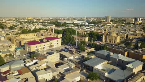 atmospheric drone shot of old city in bukhara, uzbekistan
