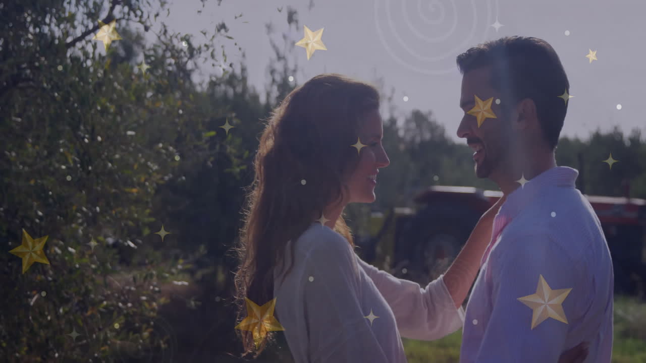 Couple standing in orchard, highlighting star overlays and tractor icons for agriculture marketing