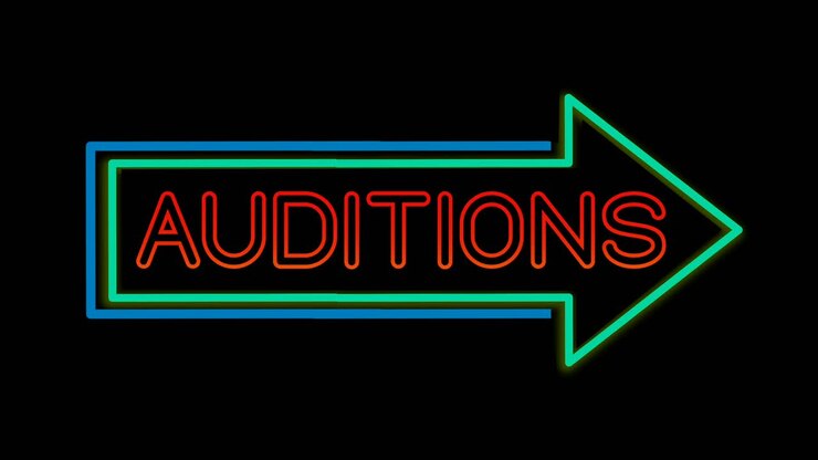 Animated neon Auditions sign with right facing arrow