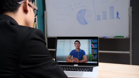 businessman talk with business partner using video call on modern laptop