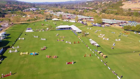 aerial footage of a show jumping course at an equestrian park