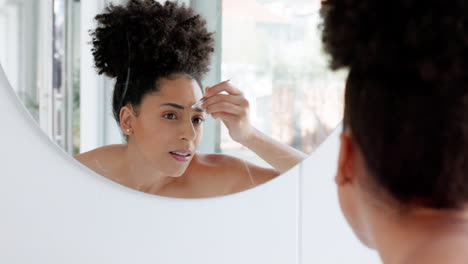 Mirror,-makeup-and-black-woman-shape-eyebrows