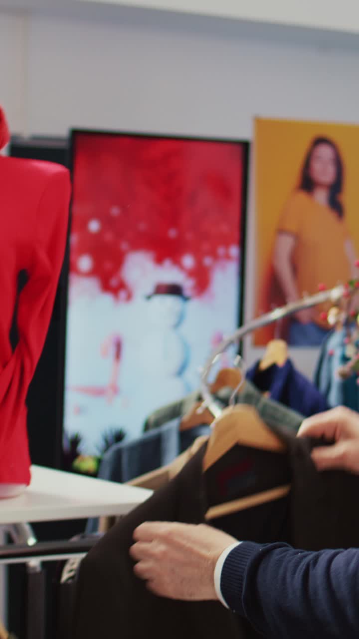 Vertical video Senior client shopping for clothes
