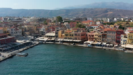 old venetian port of chania with waterfront restaurants and hotel in crete, greece