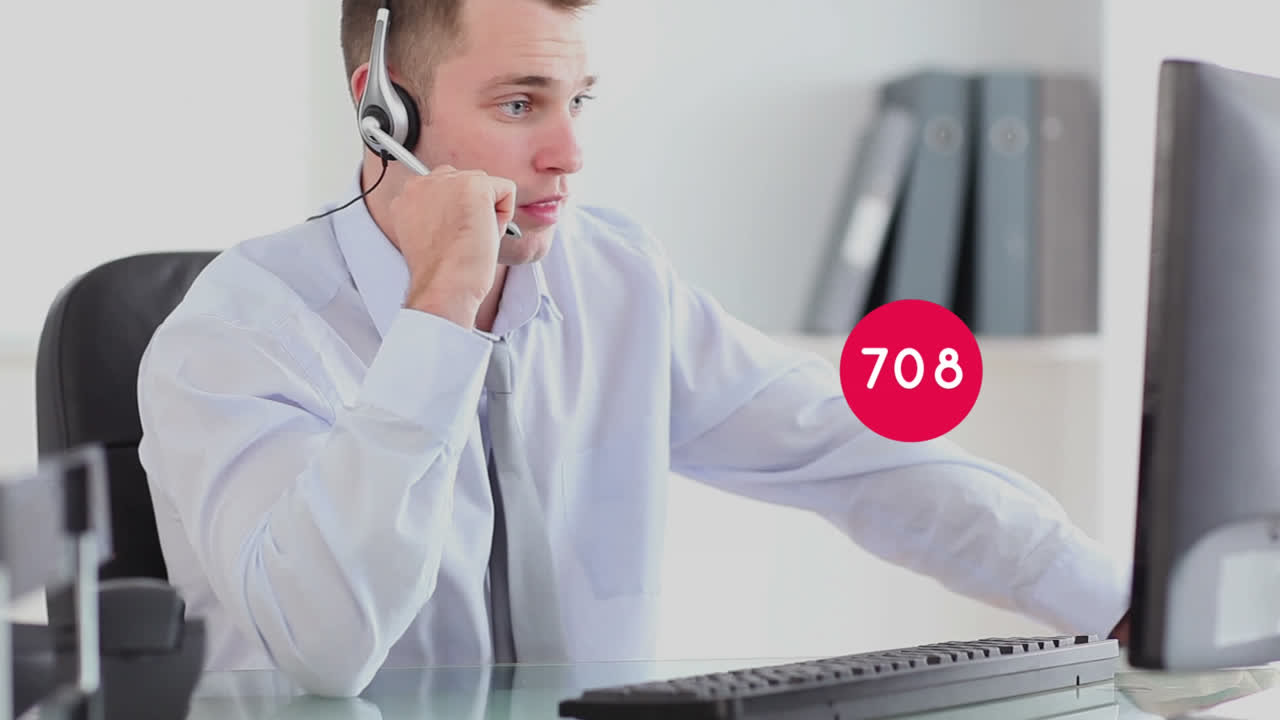 Animation of numbers changing over businessman wearing phone headset