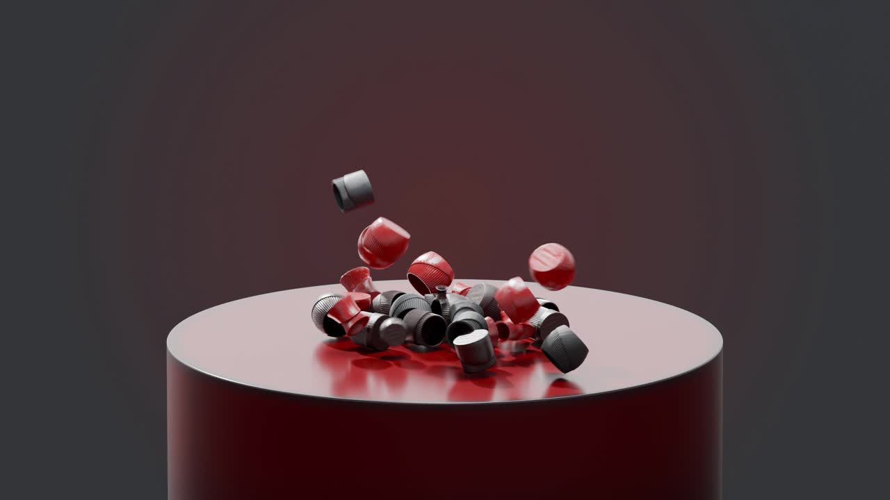 Abstract Composition of Red and Black Bottle Caps on a Red Cylinder