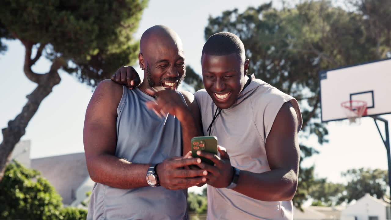 Father and son watching phone