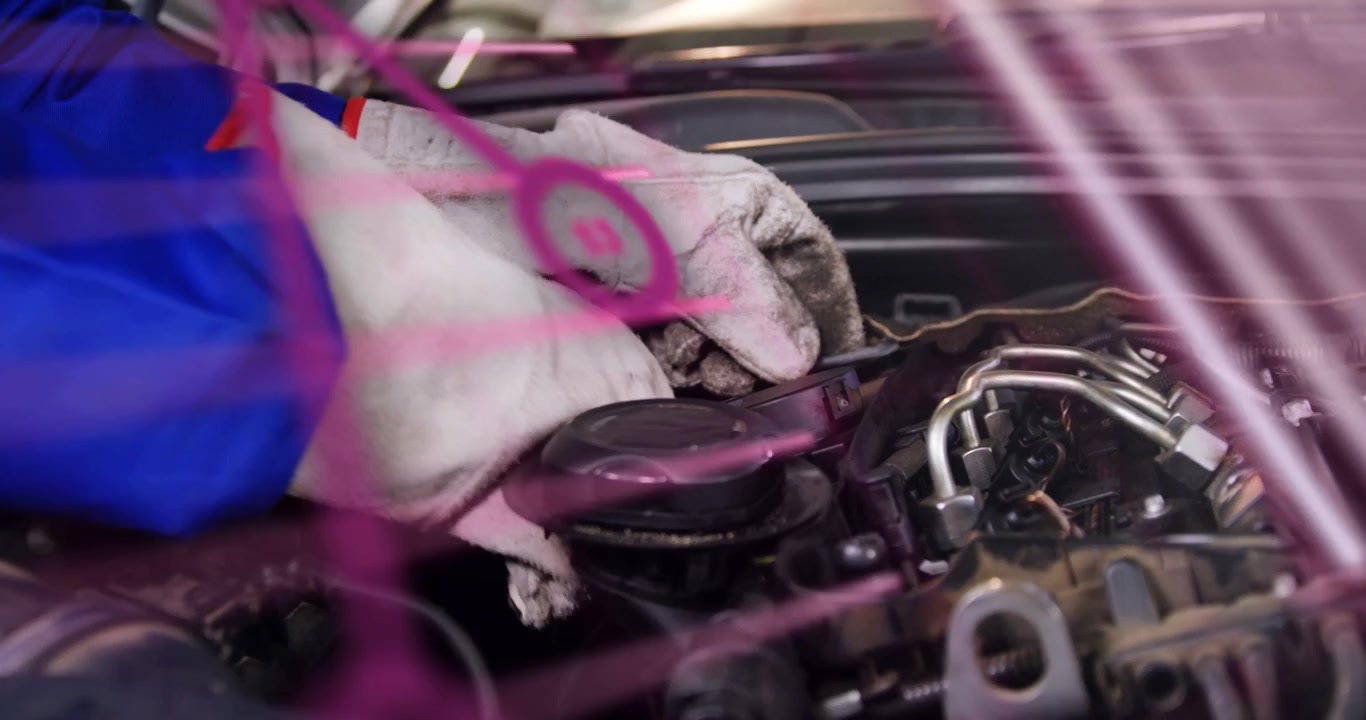 Mechanic gloved arm entering hood, turning cap, adjusting hoses, showing pink overlay for repair