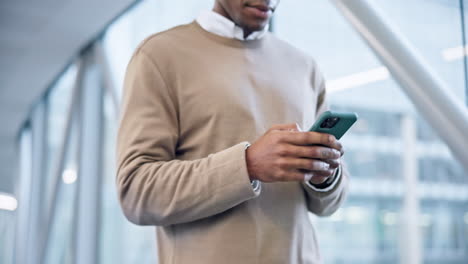 Phone,-walking-and-hands-typing-in-airport