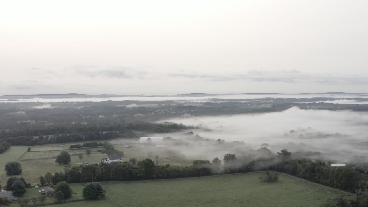 DJI Mavic 2 Pro shot of Mist from a mountain area flowing into a valley region in 4K24p D-Log.