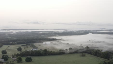 dji mavic 2 pro shot of mist from a mountain area flowing into a valley region in 4k24p d-log.
