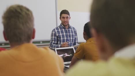 Teacher-talking-at-his-high-school-class